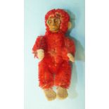 Schuco, a 1930's miniature red mohair jointed monkey with metal face, 6.5cm tall.