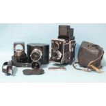 A Mamiya C3 Professional TLR camera with Sekor F/2.8 f=80mm lenses, Sekor f4.5 f=18 lenses and