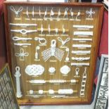 A selection of sailors knots mounted in a glazed display case, 79 x 62.5cm, a small collection of