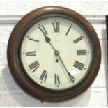 An HAC circular wood case wall clock, 40cm diameter, with key and pendulum, the dial with crossed