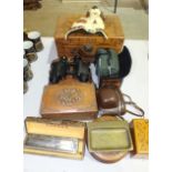 A miniature carved camphor wood chest, 31cm high, a pair of Taylor Hobson XG binoculars, 1943, a