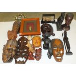 A Chinese cork diorama, 23 x 14cm, various wooden masks, heads, etc.