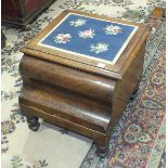 A Victorian step commode with serpentine front, on turned legs.
