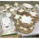 A large quantity of Royal Albert Old Country Roses tea and dinner ware, comprising: large teapot,