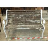 A 20th century alloy garden bench with wood slatted seat.