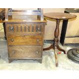 A mid-20th century low oak three-drawer chest with acorn-shaped handles, 52.5cm wide, 64cm high,