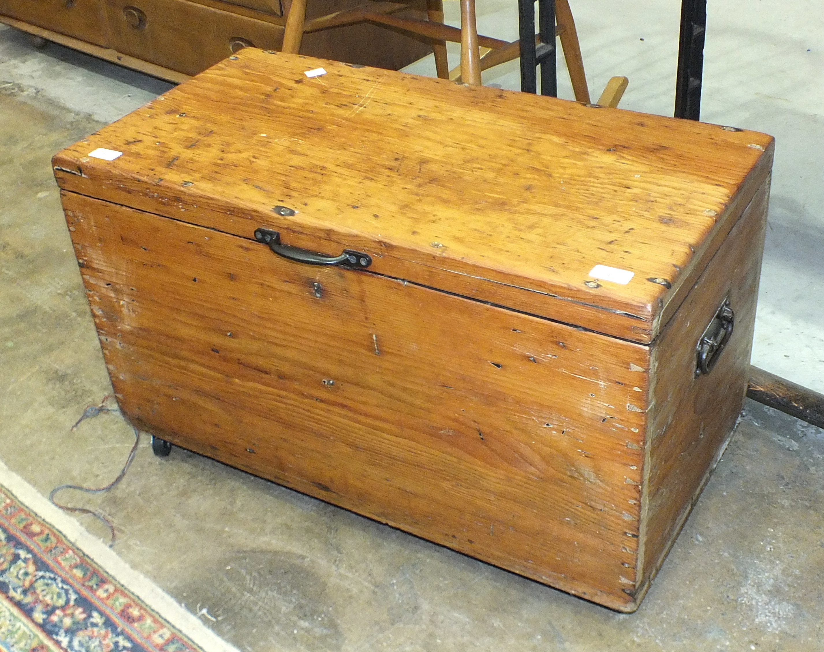 A stripped pine chest, 76.5cm wide, 46cm high.