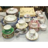 A collection of decorative ceramic plates, various tea ware, etc.