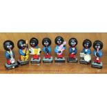 A collection of eight vintage mid-20th century Robertson's Golly figures portraying band members, (