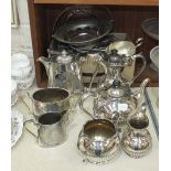 A four-piece plated tea service of half-gadrooned decoration by James Dixon & Sons, a three-piece
