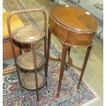 An oval sewing table and a three-tier oak folding cake stand, (2).