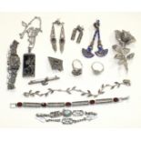 A silver, marcasite and garnet bracelet and a quantity of marcasite jewellery, (some set in silver).