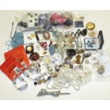 A large collection of costume jewellery, watches, etc.