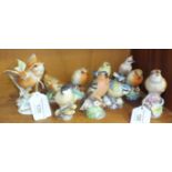 A collection of ten Royal Worcester bird sculptures: 'Fledgling Wren', 'Robin' x2, 'Wood