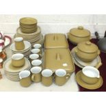Fifty-seven pieces of Denby 'Ode' pattern dinner and tea ware, including two covered casserole/