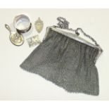 An early-20th century silver-plated chain mail purse stamped Leviathan Plate, a silver napkin ring