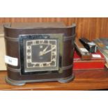 A Smiths Bakelite electric Art-Deco-style mantel clock, 18cm wide, 15cm high, an MGM Trichordi