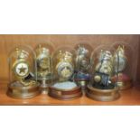 A collection of six Franklin Mint 'John Wayne' pocket watches with chains, under glass domes, (6).