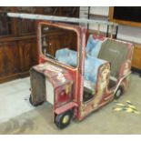 A wooden fairground ride in the form of a fire engine, 130cm long, 76cm wide, 115cm high, (in need