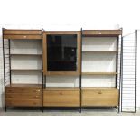 A Ladderax bookcase unit comprising five metal ladders, two drop-down door cabinets, a three-