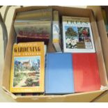 A large collection of miscellaneous books contained in three boxes.