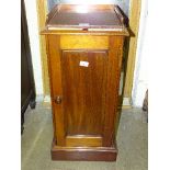 A late-19th/early-20th century mahogany pot cupboard fitted with a single door, on plinth base, 36.