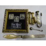 Three miniature silver photograph frames, Birmingham 1924, each measuring 2 x 2.5cm, containing