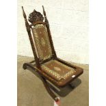 An inlaid hardwood folding chair with leather panel seat and back, the back inlaid with 'Elegant