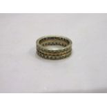 A 9ct gold eternity ring set synthetic white stones, size M½, 4.4g.