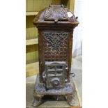 A Martin, an Art Nouveau cast iron wood-burning stove, painted brown, 87cm high, 39cm wide.