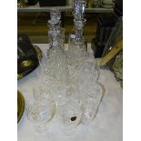 A pair of Waterford cut-crystal glass decanters and stoppers, 33.5cm high, two other cut-glass