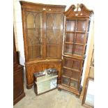 A reproduction concave-glazed corner cupboard, 189cm high, 93cm wide, a modern glazed display cab