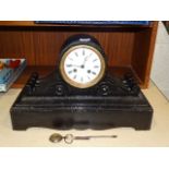 A late-19th century French black-painted wood case clock, the drum movement stamped Marti, 25.5cm