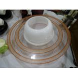 A 1960's/70's opaque glass 'Saturn' hanging light fitting, (chip to rim), 40cm diameter, various tea