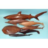 A collection of seven hardwood marine animal models, including a ray, 42cm long, a dolphin and a