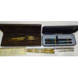 An S Mordan & Co. silver propelling pencil holder, a modern Sheaffer gold-plated fountain pen and