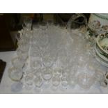 A cut-glass basket shape bowl and jug, and a collection of drinking glasses, including Champagne