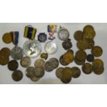 A George III 1819 crown, other coinage and badges.