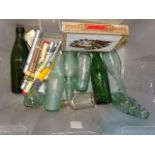 Four glass Codd bottles, including The Yacht Beverage Co. Ltd, Exeter, a Schweppes torpedo bottle,