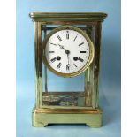 A French brass four-glass mantel clock with Japy Frères bell-striking movement, circular enamel