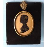 Dillon of Dock, (fl. 1810-1844), an early-19th century cut silhouette on card, embellished in gold