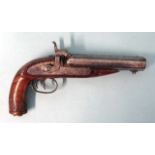 A 19th century percussion double-barrelled pistol with 12cm barrels and walnut stock, 23cm overall