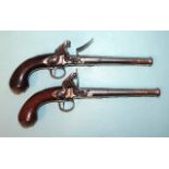 A pair of 18th century flintlock cannon-barrelled pistols by Pounce, London, each with torn-off