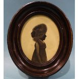 Charles Buncombe (1795-1830), (attrib.), a late-18th century painted silhouette on card, portrait of