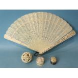 A 19th century Chinese ivory pierced fan, a silver-mounted Canton ivory oval box, one other box