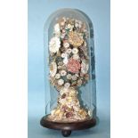 A Victorian shell floral display in the form of a tree, under glass dome, (dome broken), 41cm high