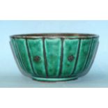 Wilhelm Kage (1889-1960) for Gustavsberg, an 'Argenta' green-glazed bowl with silver floral
