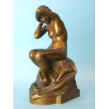 C Aaron, a bronze figure of a seated nude female shielding her face with her left arm, 17cm high,