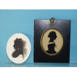 A 19th century silhouette painted on card of an unknown woman, 75 x 60mm, with partial label of