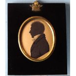J H Gillespie (fl.1810-1838), an early-19th century painted silhouette on card of an unknown man, in